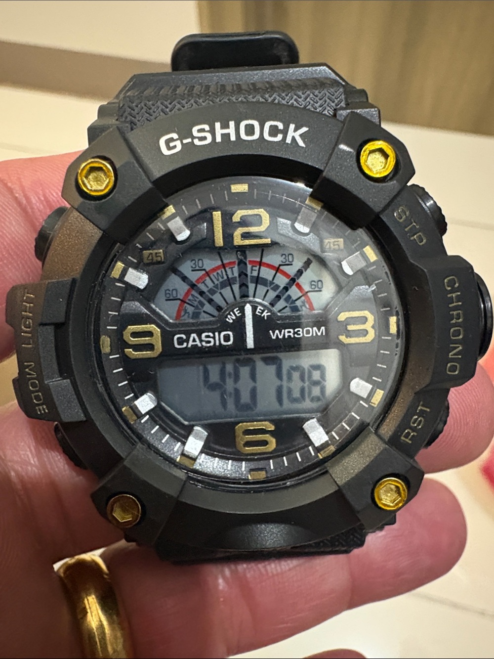 Casio G-Shock Black Watch with Gold Accents (reps)